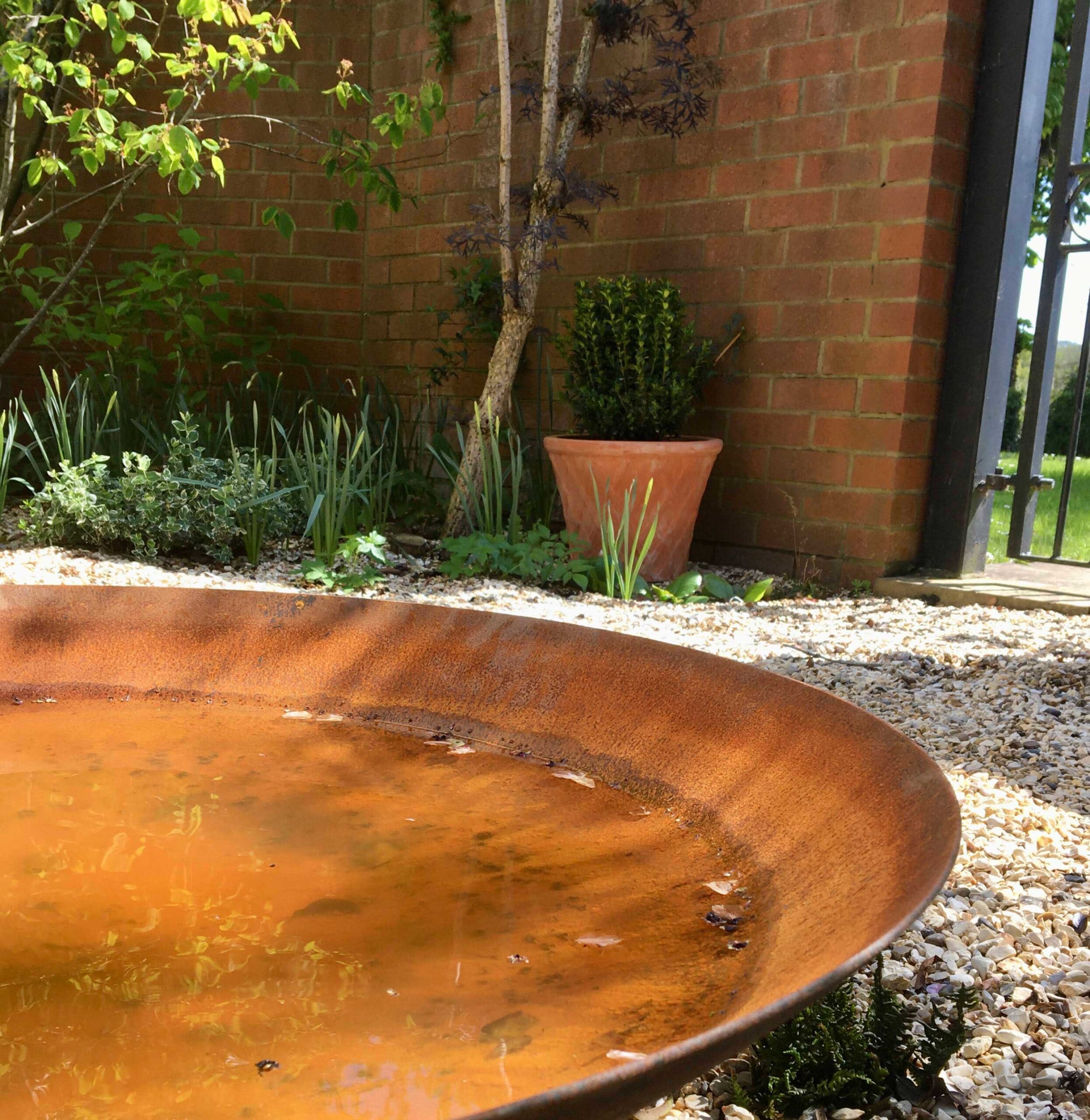 water bowl, gravel garden